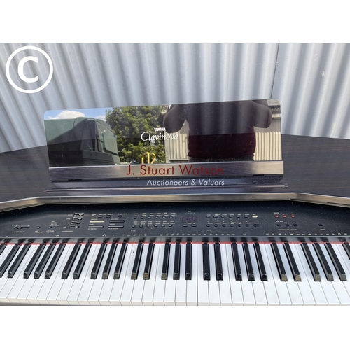 12 - A Yamaha clavinova CVP35 electric piano