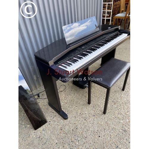 12 - A Yamaha clavinova CVP35 electric piano