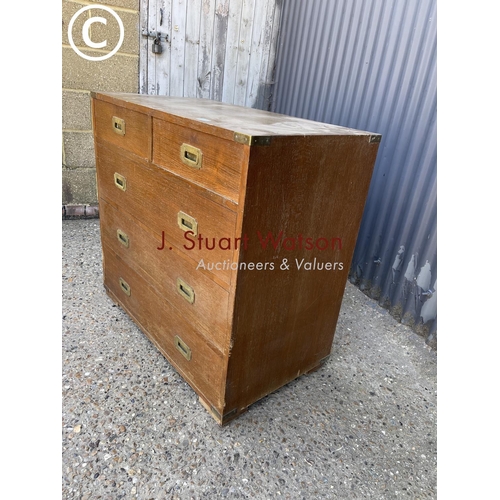 17 - A mahogany military style chest of five drawers 93x50x90