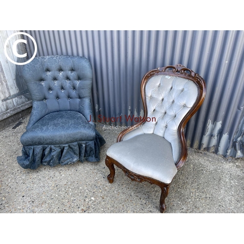 28 - Two blue upholstered buttoned bedroom chairs