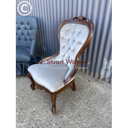 28 - Two blue upholstered buttoned bedroom chairs