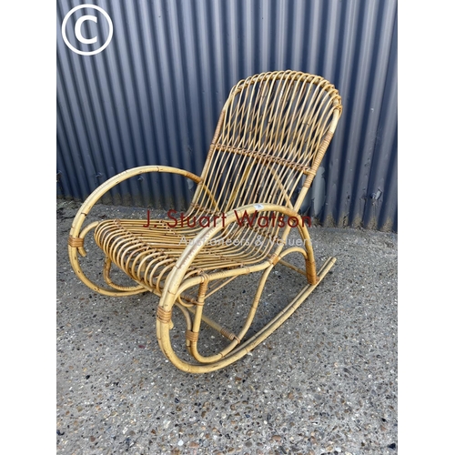 38 - A mid century bamboo rocker chair