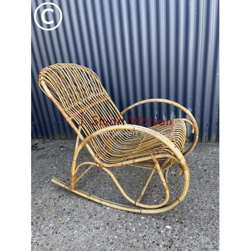 38 - A mid century bamboo rocker chair