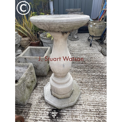 393 - A concrete pedestal bird bath