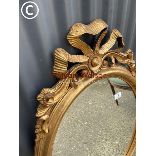 4 - An ornate gold gilt hall mirror 60w 100h