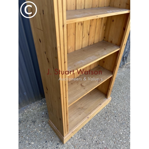 49 - A solid pine bookcase 81w 200h