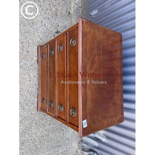 51 - A small mahogany chest of four drawers