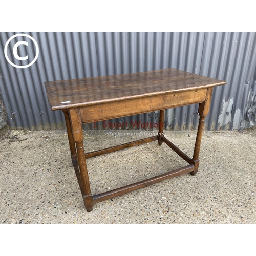 7 - An antique oak table 102x60x72