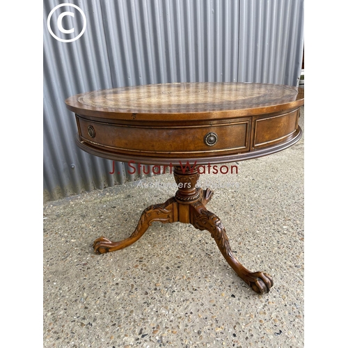 8 - A mahogany drum table with drawer and gold leather top 95cm round