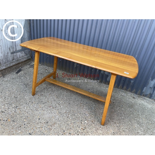 99 - An original Ercol CC41 plank Dining table 135x70x77