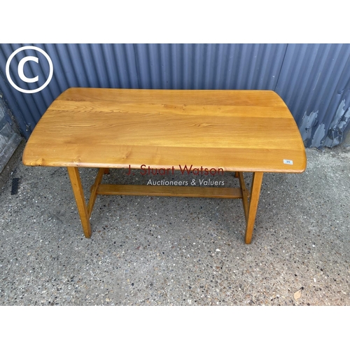 99 - An original Ercol CC41 plank Dining table 135x70x77