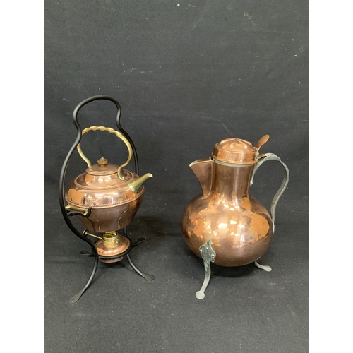 559 - Art Nouveau Copper spirit kettle on stand and copper jug, height 32cms