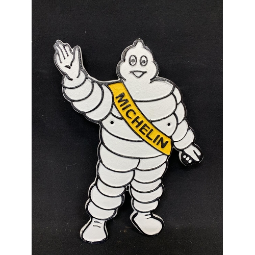 620 - Michelin man cast iron plaque, height 35cms