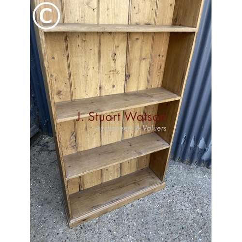 216 - A country pine bookcase 77wide 194 h