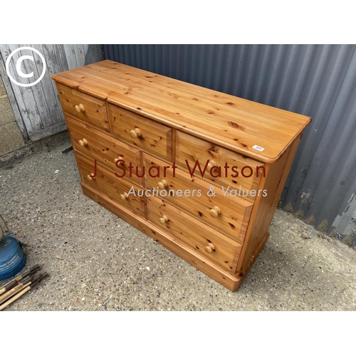 103 - A solid pine chest of seven drawers