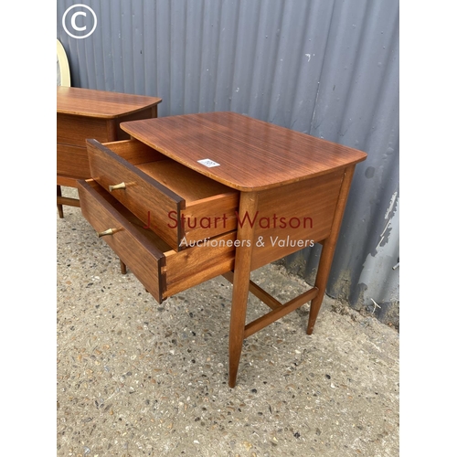 107 - A pair of mid century teak bedsides