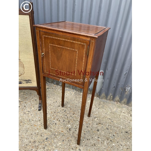 154 - An Edwardian mahogany pot cupboard  together with a tapestry fire guard