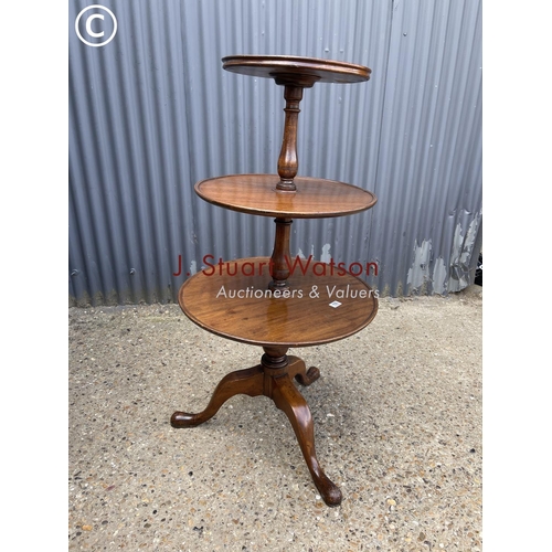 155 - A Georgian mahogany three tier dumb waiter stand 4ft tall (af to foot, loose at screw joints)