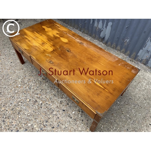 160 - A yew reproduction military style coffee table