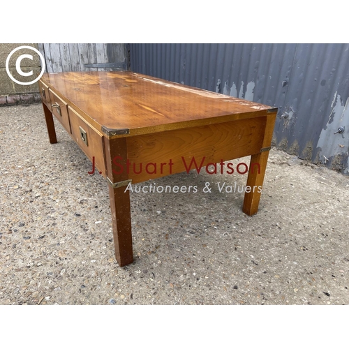 160 - A yew reproduction military style coffee table