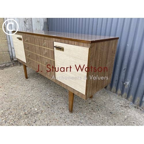 162 - A retro formica sideboard