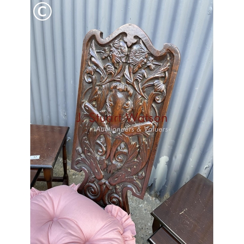 17 - A carved oak chair together with two oak nests of three