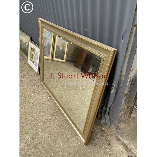 178 - A large overmantle mirror together with four pictures