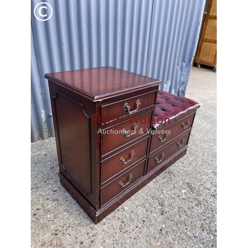 18 - A mahogany hall seat with red chesterfield seat