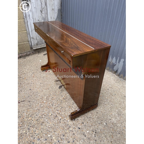 182 - A mahogany cased compact upright  piano