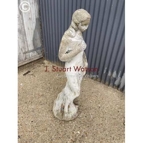 187 - A concrete statue of a lady 130cm tall