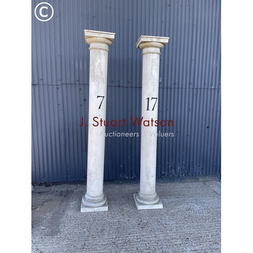 191 - A pair of very large plastic pillars 260cm tall