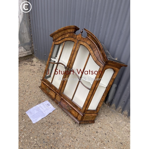 210 - A Georgian walnut wall cabinet with two drawers