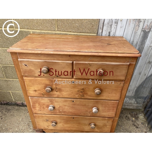 231 - A stripped pine chest of five drawers foot AF