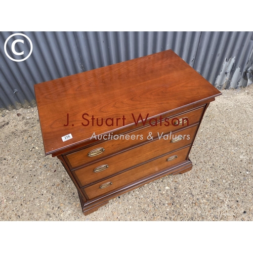 256 - A reproduction mahogany chest of three drawers by Stag