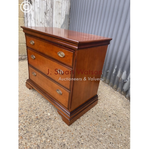 256 - A reproduction mahogany chest of three drawers by Stag