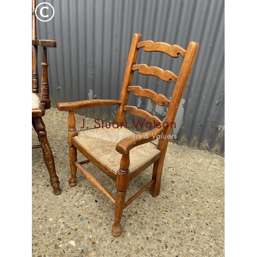 268 - A stick back elbow chair together with a rush seat child's chair