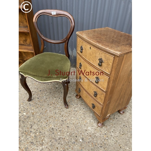 277 - A pair of balloon back chairs, book shelf and walnut chest of drawers