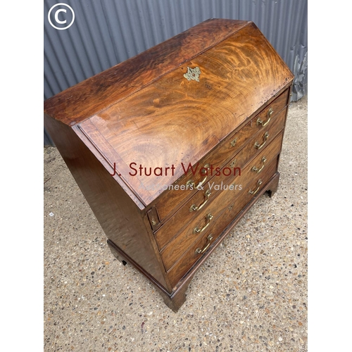 283 - A Georgian mahogany bureau with fitted interior