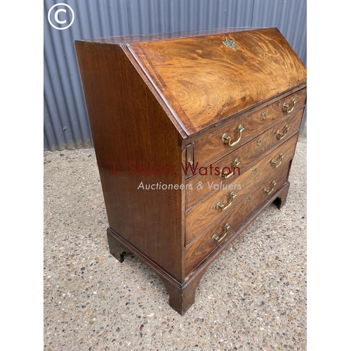 283 - A Georgian mahogany bureau with fitted interior