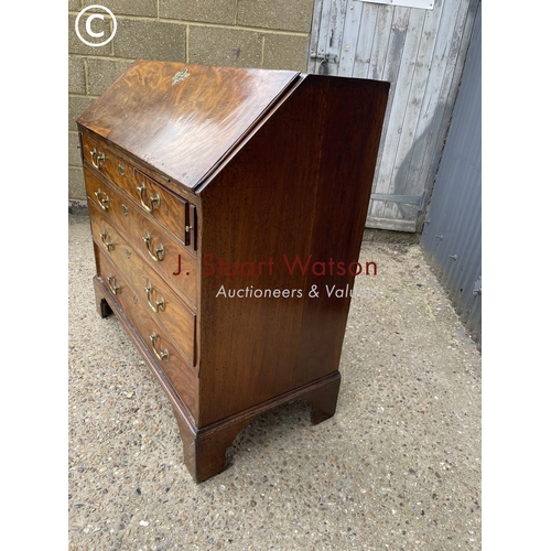 283 - A Georgian mahogany bureau with fitted interior