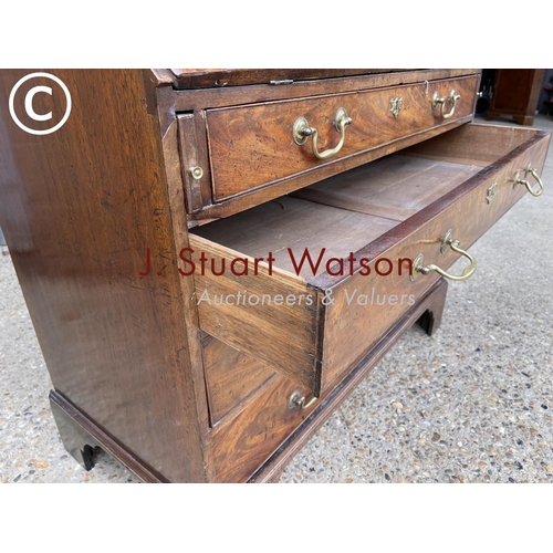 283 - A Georgian mahogany bureau with fitted interior