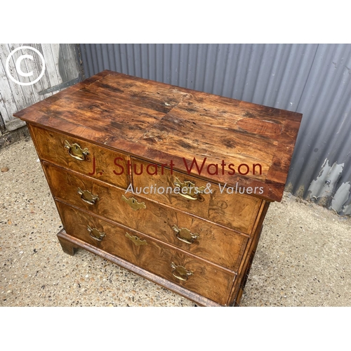 286 - A Georgian walnut chest of four drawers 98x57x 88