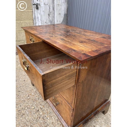 286 - A Georgian walnut chest of four drawers 98x57x 88