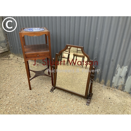 314 - An Edwardian mahogany washstand with blue and white bowl  together with an oak swing mirror