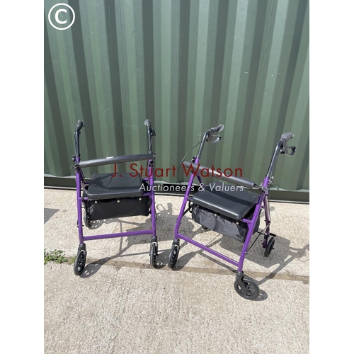 340 - Two purple mobility walkers