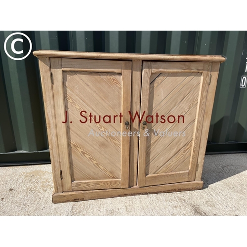 362 - A pine two door larder cupboard 120x33x103