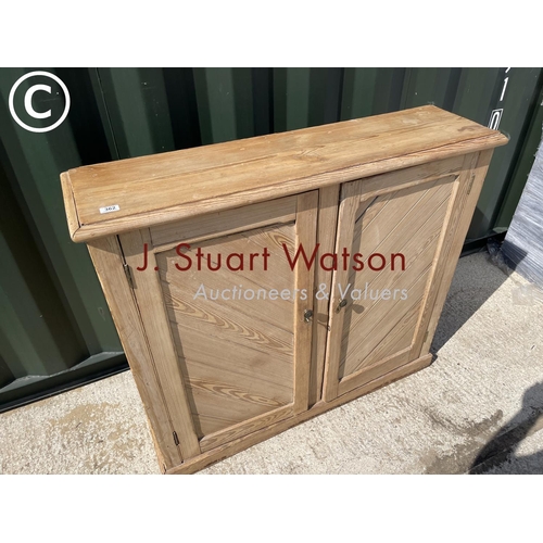 362 - A pine two door larder cupboard 120x33x103