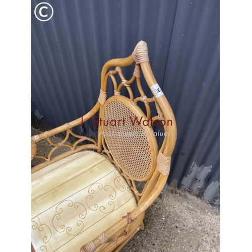 39 - A pair of bamboo carver chairs