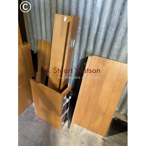 50 - A collection of teak tapley 33 wall box system consisting of 4 cupboards, 3 cabinets and other shelv... 