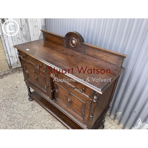 52 - An early 20th century oak sideboard